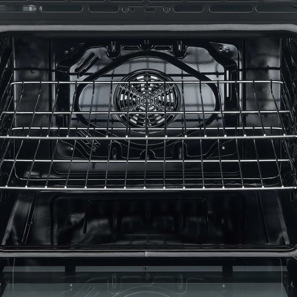 Interior view of the Forno 30-inch electric range in stainless steel, showing a spacious black enamel oven cavity with multiple rack positions and included wire racks for flexible cooking and baking options.