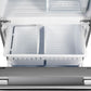 Bottom freezer drawer of the Forno 30-inch French door refrigerator in stainless steel shown open, revealing a spacious interior with deep storage compartments for organizing frozen foods efficiently.