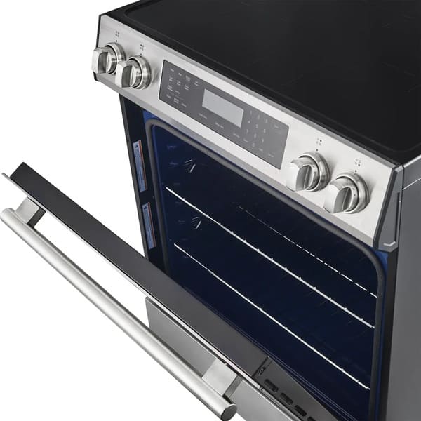Close-up of the oven door on the FORNO 30-inch induction range in stainless steel, highlighting the sturdy handle and sleek, modern design.