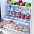 Interior view of the FORNO 31-inch left-hinge refrigerator in white, highlighting the adjustable glass shelves and spacious pull-out drawers for organized food storage.