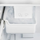 Close-up of the built-in ice maker inside the FORNO 36-Inch French Door Refrigerator in White, showing the compact design and ice storage compartment.