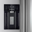 Close-up of the ice maker inside the FORNO 36-inch side-by-side refrigerator in stainless steel, showing the ice storage bin and dispensing mechanism.