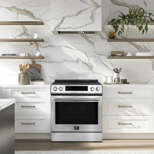 FORNO 30-inch induction range in stainless steel shown in a modern kitchen setting, emphasizing its sleek design and professional style.