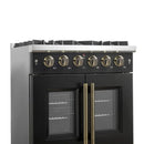 Left-angled close-up of the control panel on the FORNO Galiano 30-Inch French Door Gas Range in black, featuring stainless steel knobs with precision markings and a sleek matte black front panel.