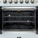 Interior view of the FORNO Galiano 30-Inch French Door Gas Range in white, highlighting the vibrant blue enamel cavity, convection fan, and multiple chrome oven racks for flexible, even cooking.