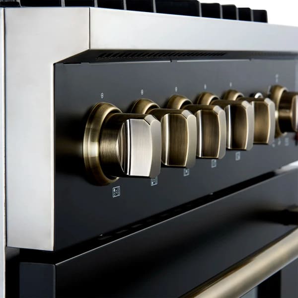 Angled close-up of the control knobs on the FORNO Giovanni 30-Inch Gas Range in black, showcasing stainless steel finishes, precision temperature markings, and a modern matte black panel.