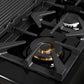 Close-up of a brass burner on the Forno Antico 48-Inch Gas Range, highlighting precision flame ports, durable cast iron grates, and a polished stainless steel cooktop surface.