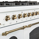 Close-up of the control knobs on the Forno Antico 48-Inch Gas Range in white, featuring polished brass bezels, stainless steel construction, and precision markings for accurate temperature control.
