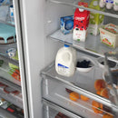 Close-up view of the interior drawer in the FORNO Maderno Convertible Refrigerator-Freezer, highlighting smooth gliding rails and stainless steel storage finish.