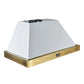 Angled view of the Forno Vittorio 48-Inch Wall Mount Range Hood in white, showcasing its sleek, tapered canopy with antique brass trim and integrated stainless steel baffle filters for a stylish and high-performance kitchen ventilation solution.
