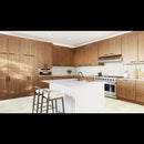 Modern kitchen with wooden cabinets, white island, and stainless steel appliances.